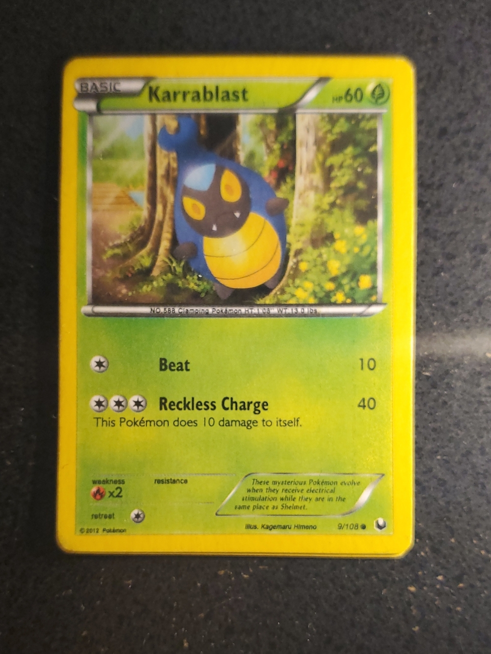 Karrablast Trading Card - Yellow & Green
